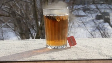 Hot tea outdoors Stock Footage 73006895
