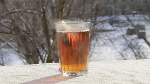 Hot tea outdoors Video stock 73006932