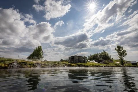 A hot thermal bath with an old bathhouse on Iceland in Fludir. Foto stock