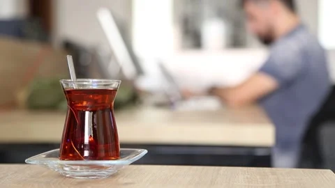 Hot Turkish Tea in the Office Stock Footage 219674809