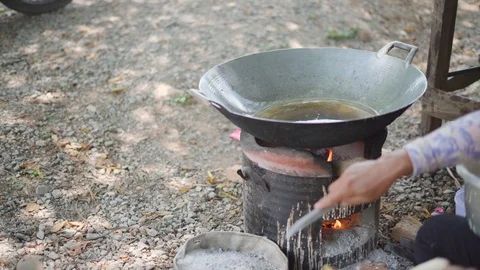 Hot vegetable oil on an old pan Stock Footage 89617195