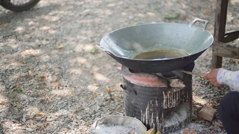 Hot vegetable oil on an old pan Stock Footage 89617666