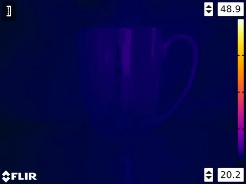 Hot water in a cup with thermal camera Stock Footage 89541616