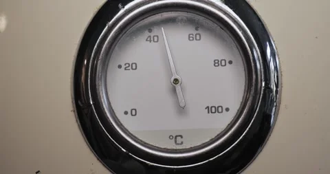 Hot water thermometer on heater Stock Footage 327687860