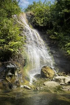 Hot waterfall pouring down Stock Photos