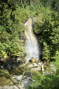 Hot waterfall surrounded by grass Stock Photos