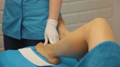 Hot wax depilation procedure Stock Footage 97358733