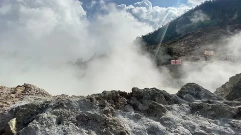 Hot white smoke cloud from hot crater in close distance shot Stock Footage 201644039