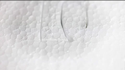 Hot wire writing the script love on white slice of polystyrene. 스톡 동영상 36437290