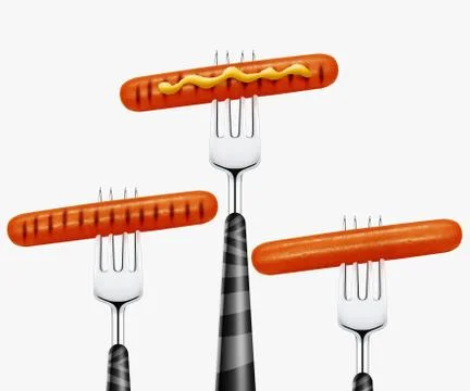 Hotdog on fork Stock Photos