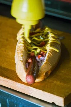 Hotdogs in making. Close up. Foto stock