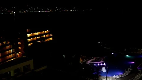 Hotel and pool, bay at night Stock Footage 81182127