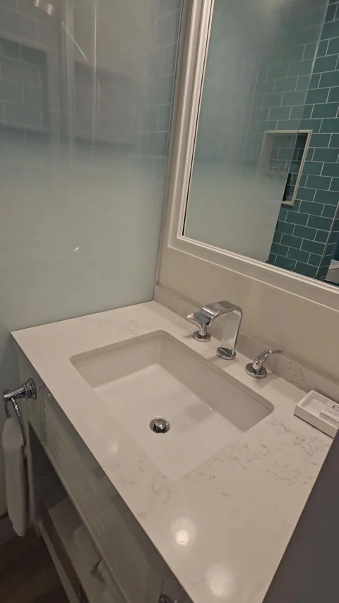 Hotel Bathroom Vanity and Walk-In Shower at Margaritaville Times Square Stock Footage 347008096