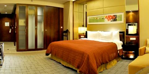 Hotel bed Stock Photos