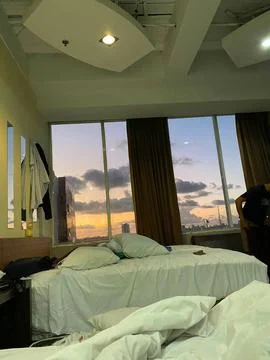 Hotel bed Stock Photos