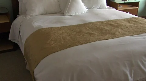 Hotel Bed Tilt up Stock Footage 436352