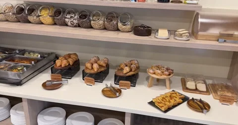 Hotel Breakfast Buffet with Bread and Pastries Stock Footage 339771658