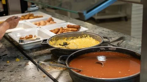 Hotel Breakfast Buffet With Scrambled Eggs Sausages and Tomato Soup 스톡 사진