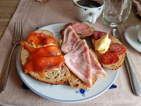 Hotel breakfast with differend cold cuts and fresh salmon Stock Photos