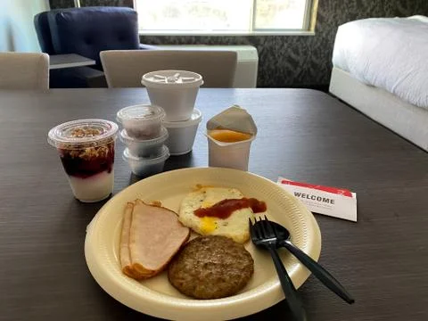 Hotel Breakfast packed individually during coronavirus pandemic Stock Photos