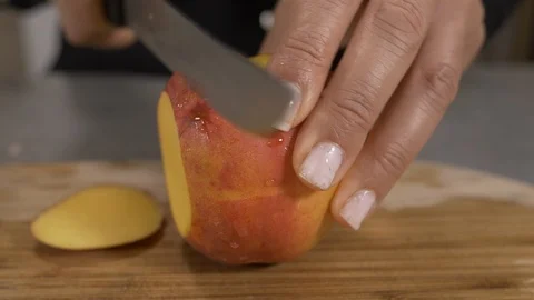 Hotel chef cutting peach to make smoothie 4k Stock Footage 96201911