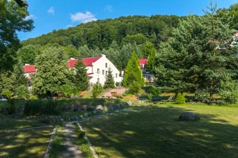 The hotel complex is on a small hill in the middle of a beautiful nature with Stock Photos