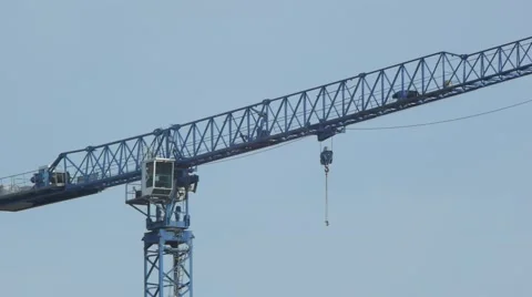 Hotel construction Crane wide tilt down Stock Footage 60760456
