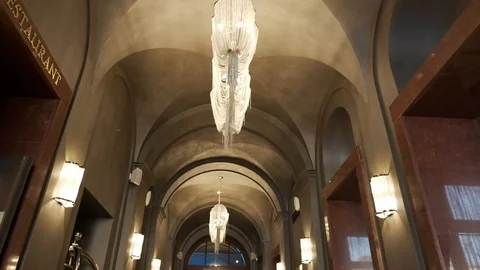 Hotel Corridor. Large Hall With Large Chandeliers. Stock-Footage 107487329