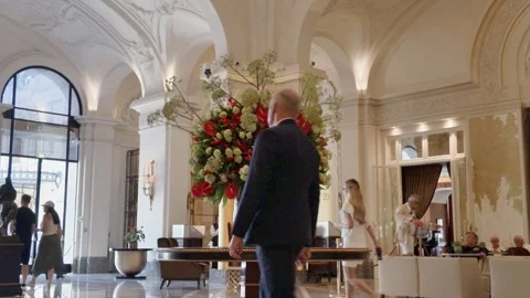 Hotel de Paris elegant lobby interior with central floral display Stock Footage 337514000