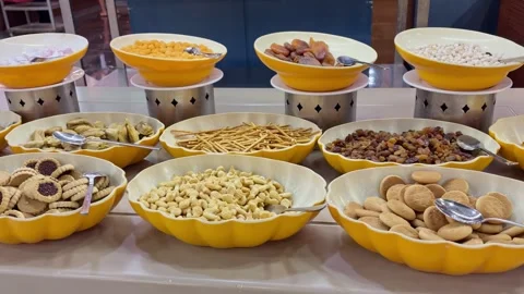 Hotel Dessert Buffet Table with Cookies, Nuts and Dried Fruits Stock Footage 345481958