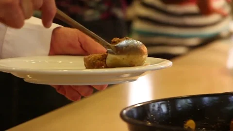 Hotel dining room. Guests Select Food From A Buffet. Stock Footage 76926554