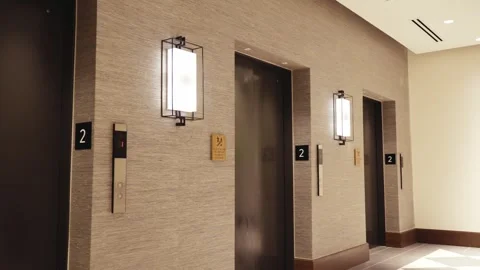 Hotel Elevator Corridor with Checkered Marble Flooring Stock Footage 333934845