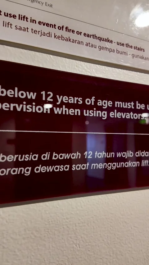 Hotel Elevator Safety Sign Regarding Children and Emergencies Stock Footage 345102423