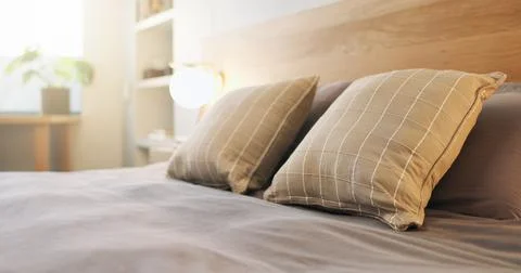 Hotel, empty and bed in room for accommodation, furniture and interior desi.. Stock Photos