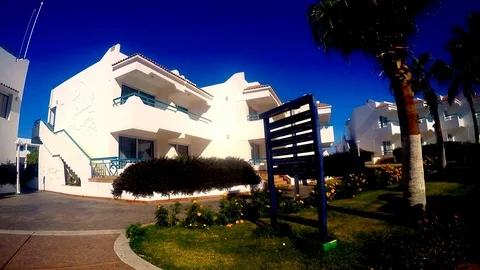 Hotel facade in Egypt with palm trees Stock Footage 87503930