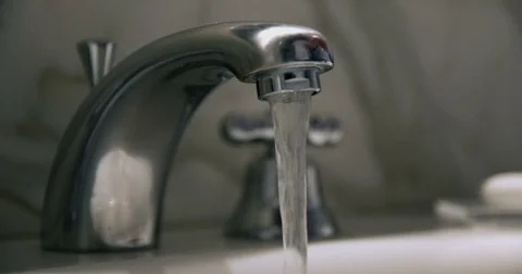 Hotel faucet in slowmotion Stock Footage 71076315