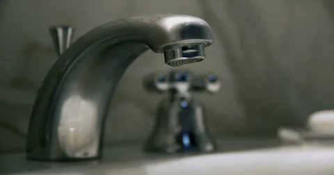 Hotel faucet in slowmotion Stock Footage 71076439