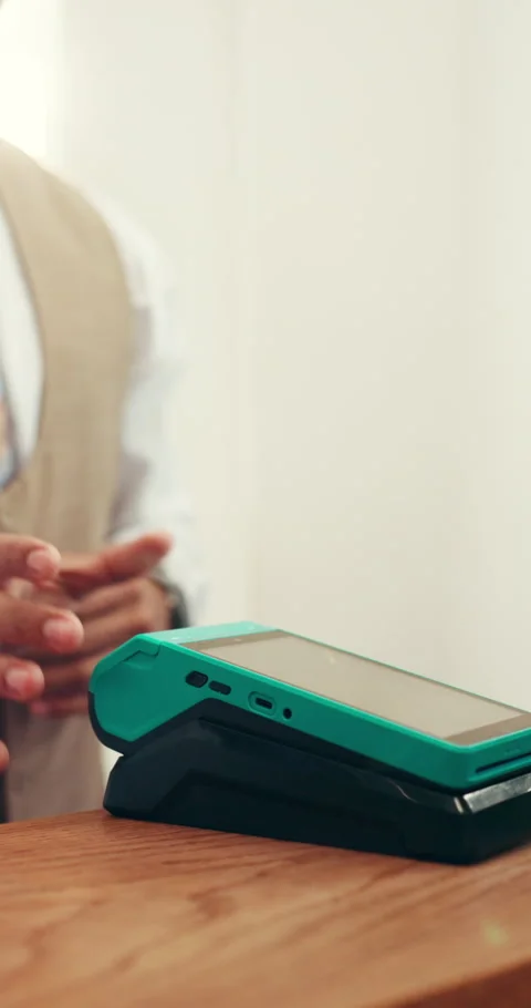 Hotel, front desk and hands of concierge with card machine for booking, Stock Footage 319555791