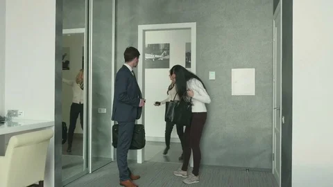 The hotel guest brings the airport worker to the room Stock Footage