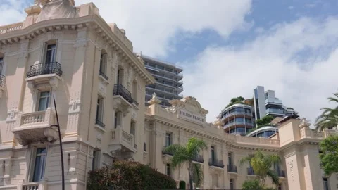 Hotel Hermitage facade and modern architecture in Monte Carlo pan right Stock Footage 337514141