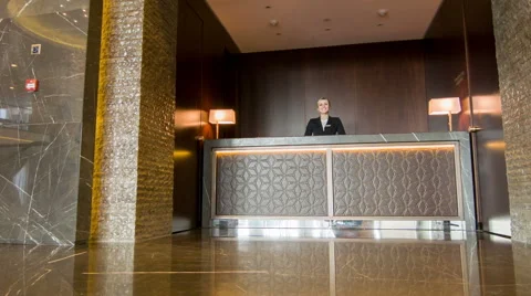 Hotel manager receiving guests Stock Footage 48473623