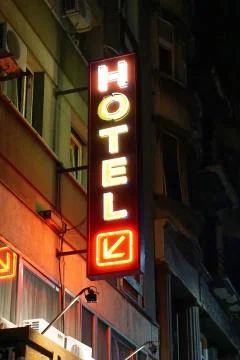 Hotel neons night Stock Photos