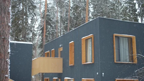 Hotel in a pine forest. Winter holidays Stock Footage 129101887