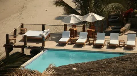 Hotel With Pool at Beach Stock Footage 10727711