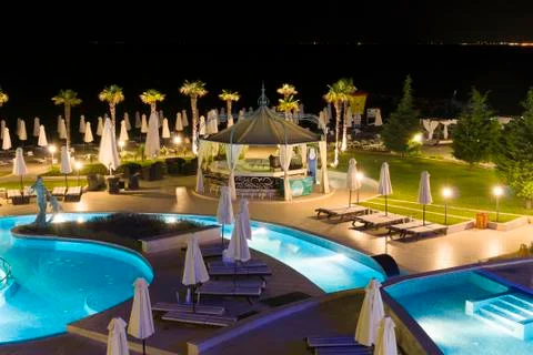 Hotel pool in night Stock Photos
