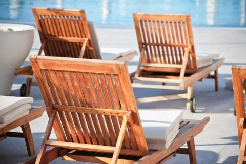 Hotel poolside chairs Stock Photos
