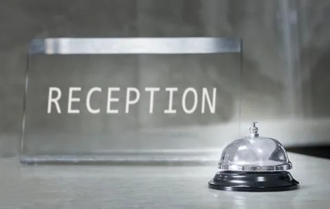 Hotel reception with bell Stock Photos