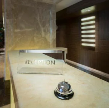 Hotel reception with bell Foto stock
