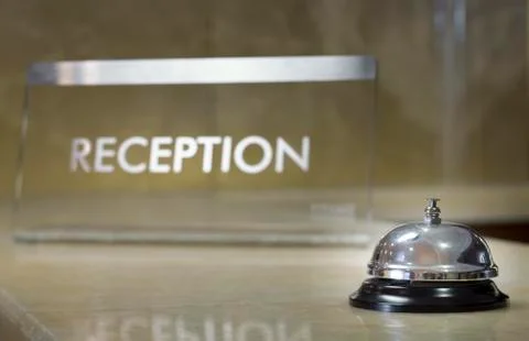 Hotel reception with bell Stock Photos