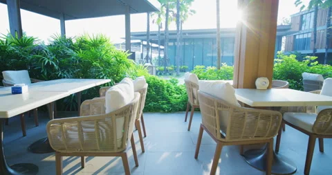 Hotel restaurant empty table breakfast food morning light Stock Footage 332221692